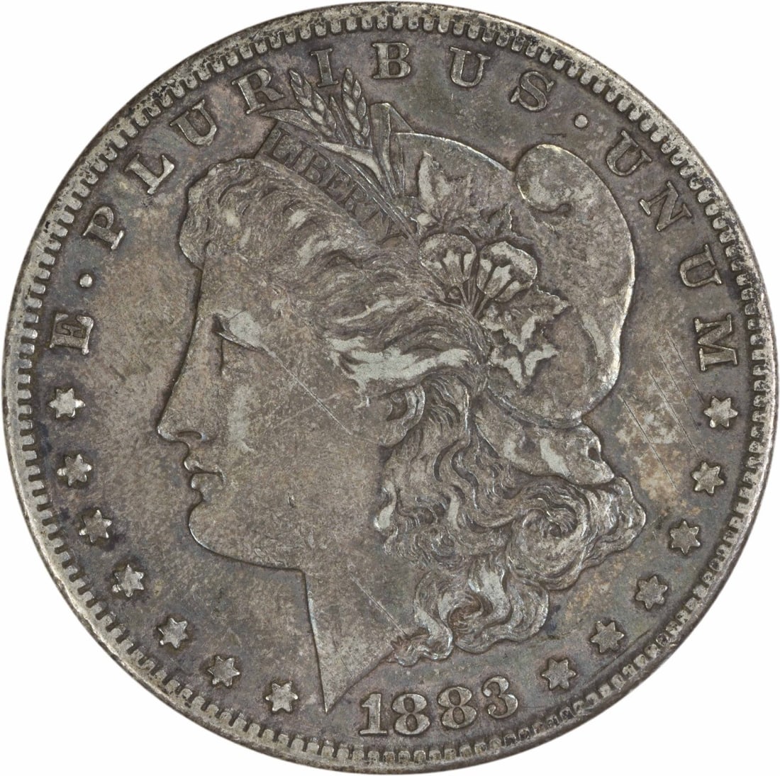 1883-S Morgan Silver Dollar XF Uncertified Silver Coin: 1883-S Morgan Silver Dollar XF Uncertified Silver Coin This 1883-S Morgan Silver Dollar is a classic collectible coin featuring a beautiful design by George T. Morgan. Struck in San Francisco, this co