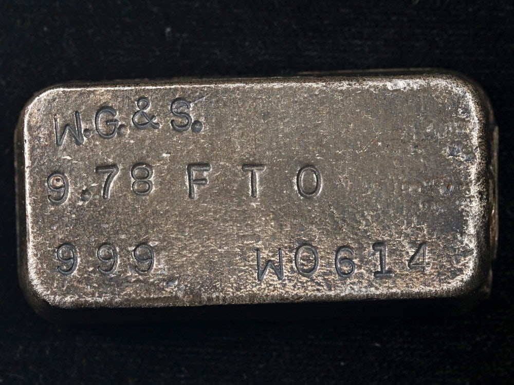 9.78 Ounce Poured Silver Bar W.G.+S. 0.999 Uncertified: 9.78 Ounce Poured Silver Bar W.G.+S. 0.999 Uncertified This vintage 9.78-ounce poured silver bar features the W.G.+S. hallmark and is composed of 99.9% pure silver. The bar showcases attractive luster