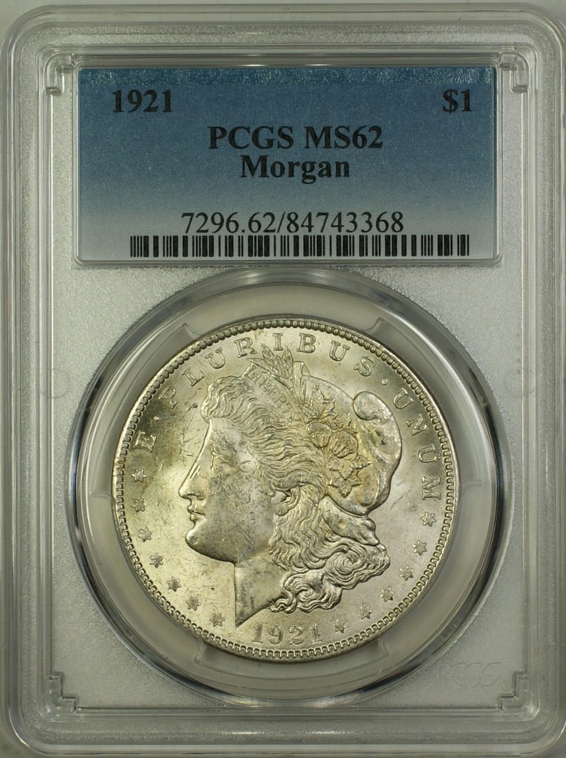 PCGS Certified 1921 Morgan Dollar Silver $1 Coin MS-62 Philadelphia Mint: PCGS Certified 1921 Morgan Dollar Silver $1 Coin MS-62 Philadelphia Mint This 1921 Morgan Silver Dollar is a $1 coin minted in Philadelphia, United States. Certified by PCGS with a grade of MS 62, thi
