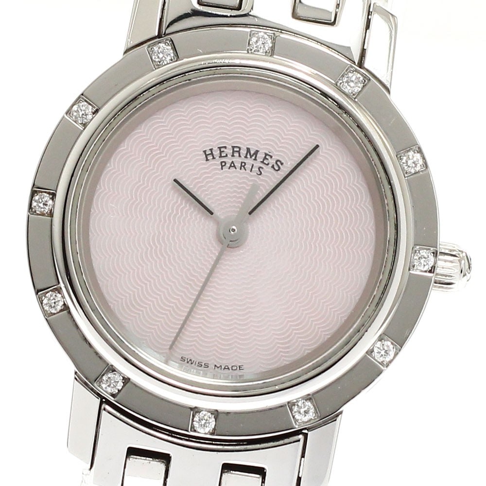 Hermes Clipper Nakule CL4.230 Quartz Ladies Wristwatch: Hermes Clipper Nakule CL4.230 Quartz Ladies Wristwatch This Hermes Clipper Nakule women's wristwatch features a stainless steel case and bracelet complemented by a pink shell dial. The quartz movement