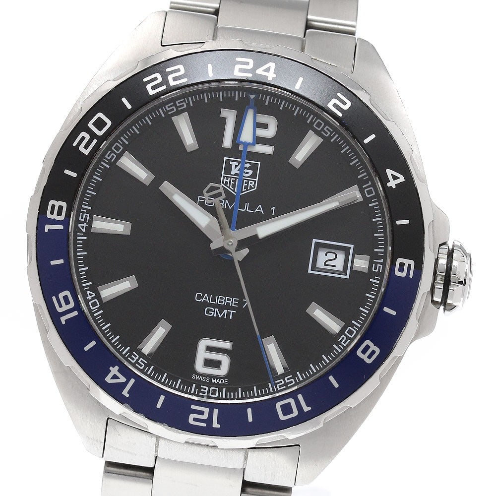 TAG Heuer Formula 1 Caliber 7 GMT WAZ211A-0 mens wristwatch: TAG Heuer Formula 1 Caliber 7 GMT WAZ211A-0 mens wristwatch TAG Heuer Formula 1 Caliber 7 GMT men's wristwatch, model WAZ211A-0. This pre-owned Swiss-made watch is designed for men and identified as a