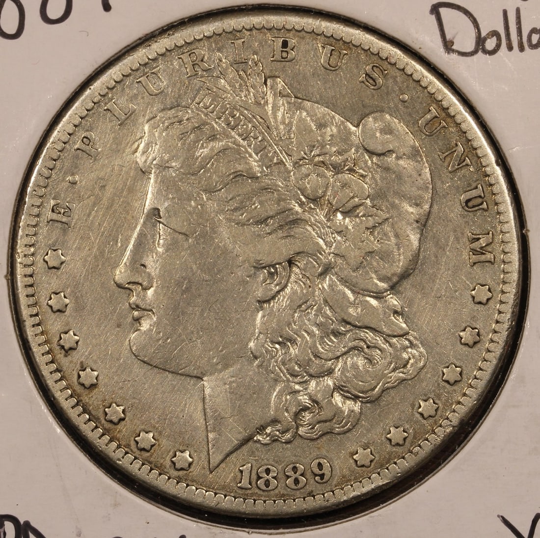Key Date 1889-CC Morgan Dollar XF Silver: Key Date 1889-CC Morgan Dollar XF Silver This 1889-CC Morgan Silver Dollar is a key date coin, featuring the classic Morgan design. Minted in the United States, it is composed of 90% silver and remain