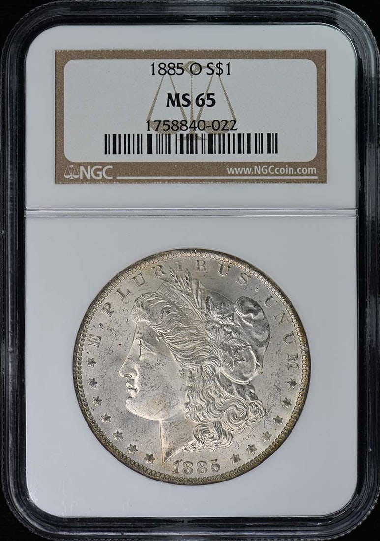 1885-O Morgan Dollar NGC MS65 Uncirculated Coin: 1885-O Morgan Dollar NGC MS65 Uncirculated Coin This exquisite 1885-O Morgan Dollar is a must-have for any coin collector. Graded MS65 by NGC, this uncirculated silver dollar showcases the intricate d