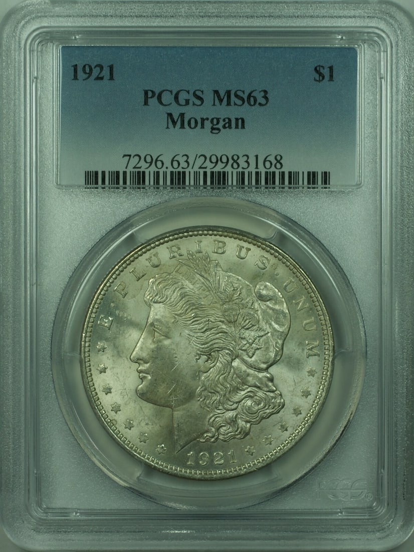 PCGS MS63 Graded 1921 Morgan Dollar Silver Coin United States $1: PCGS MS63 Graded 1921 Morgan Dollar Silver Coin United States $1 This is a 1921 Morgan Silver Dollar with a denomination of $1, certified by PCGS with a grade of MS-63. The coin is composed of silver 