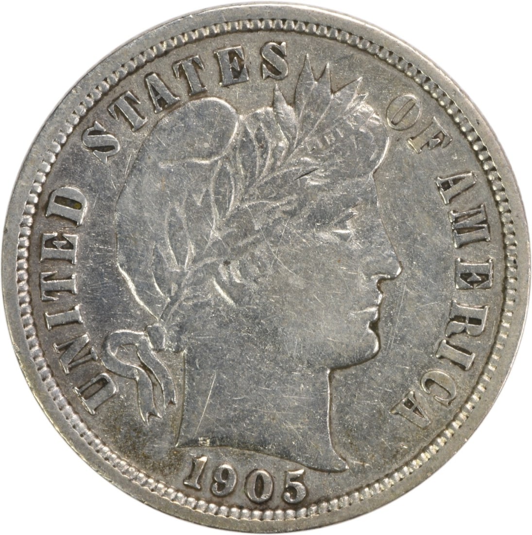 1905 Barber Silver Dime 10C by Charles E Barber Uncertified: 1905 Barber Silver Dime 10C by Charles E Barber Uncertified This 1905 Barber Silver Dime is a remarkable piece of numismatic history. Struck at the New Orleans Mint, this coin features a design by Cha