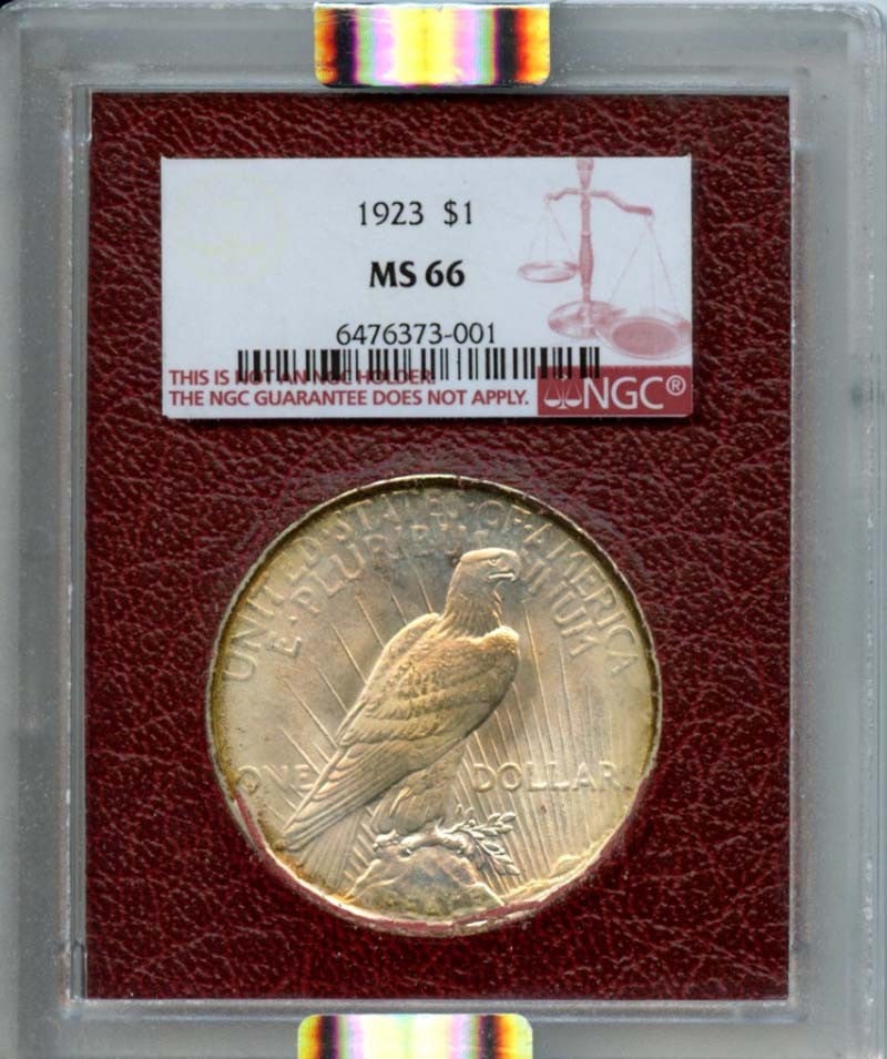 1923 Peace Dollar Silver Coin NGC MS66 Philadelphia Mint: 1923 Peace Dollar Silver Coin NGC MS66 Philadelphia Mint This 1923 Peace Dollar is certified by NGC with a grade of MS66, indicating it is in uncirculated condition. Minted in Philadelphia, this pre-o