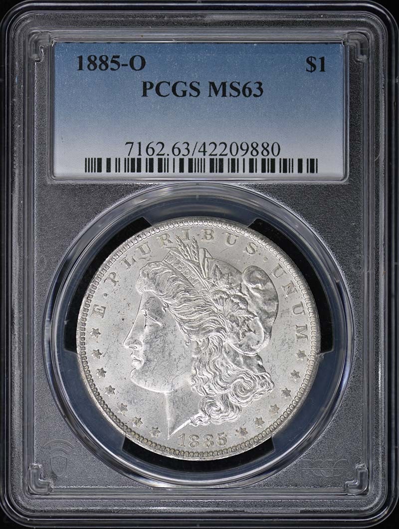 PCGS MS63 Morgan Silver Dollar 1885 New Orleans Mint: PCGS MS63 Morgan Silver Dollar 1885 New Orleans Mint This is an 1885-O Morgan Dollar graded MS63 by PCGS. The coin was minted in New Orleans and remains uncirculated, featuring the classic Morgan Doll