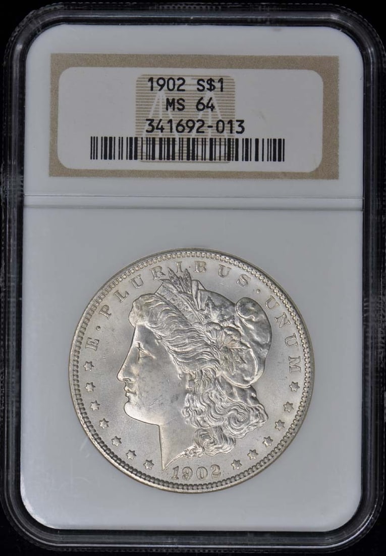 1902 NGC MS64 Uncirculated Morgan Dollar Coin Cert#34169213: 1902 NGC MS64 Uncirculated Morgan Dollar Coin Cert#34169213 This 1902 Morgan Dollar is certified by NGC, boasting a grade of MS64, indicating it is in uncirculated condition. Struck in Philadelphia, t