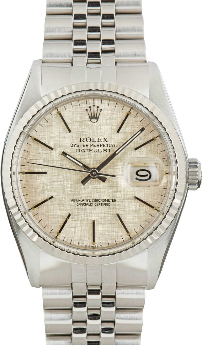 Datejust 16014 Silver Linen Dial Jubilee Bracelet Men's Watch: Datejust 16014 Silver Linen Dial Jubilee Bracelet Men's Watch This Rolex Datejust watch features a distinctive silver linen dial and a fluted bezel. It is presented on a Jubilee bracelet and is design