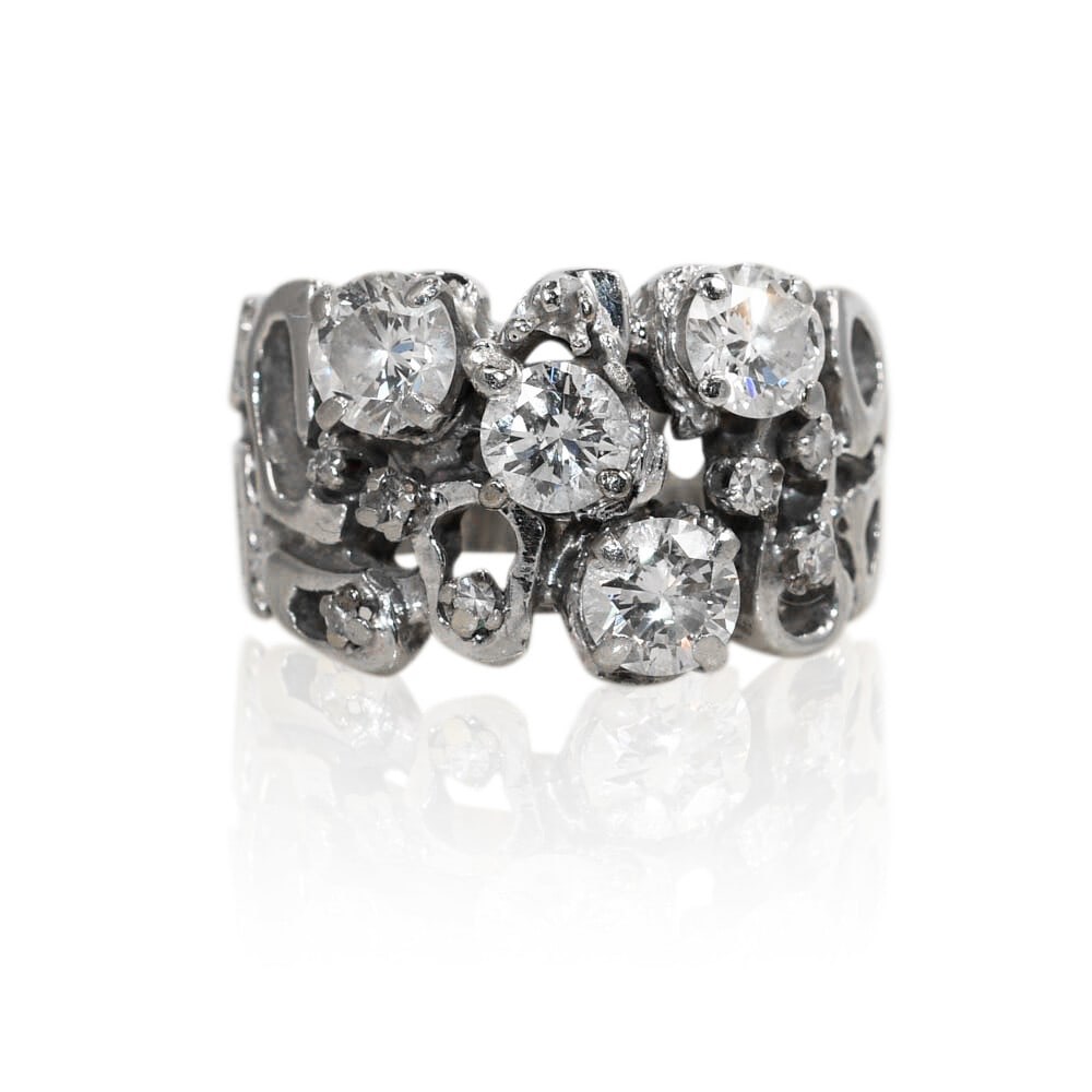 Vintage 14K White Gold Diamond Cluster Ring Size 6 8 Grams: Vintage 14K White Gold Diamond Cluster Ring Size 6 8 Grams This vintage diamond cluster ring features a free-form design crafted in 14K white gold. The ring is set with round brilliant cut natural dia