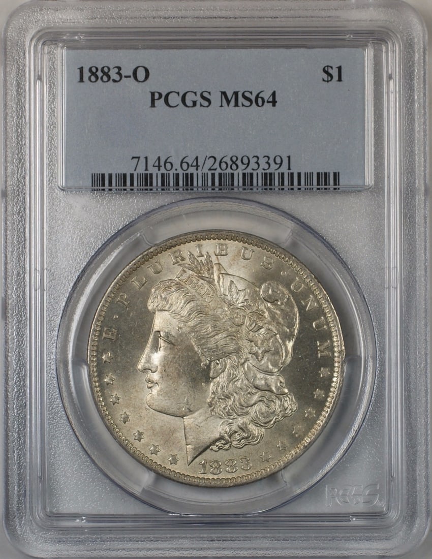 PCGS MS64 1883-O Morgan Silver Dollar: PCGS MS64 1883-O Morgan Silver Dollar This is an 1883-O Morgan Silver Dollar graded MS 64 by PCGS. The coin is lightly toned and remains uncirculated. It was minted in New Orleans and features a silve