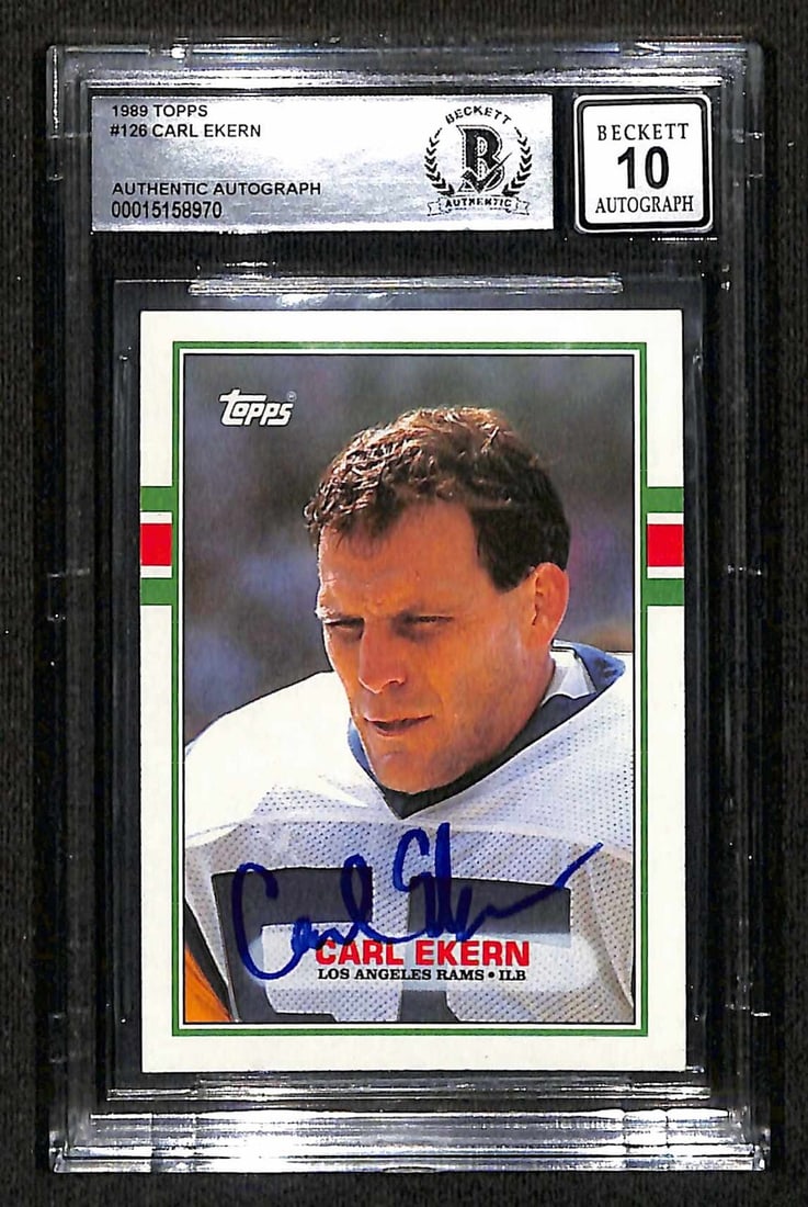 Autographed 1989 Topps #126 Carl Ekern Card Beckett 10 Auto Los Angeles Rams: Autographed 1989 Topps #126 Carl Ekern Card Beckett 10 Auto Los Angeles Rams This is an original 1989 Topps #126 sports trading card featuring Los Angeles Rams linebacker Carl Ekern. The card has been