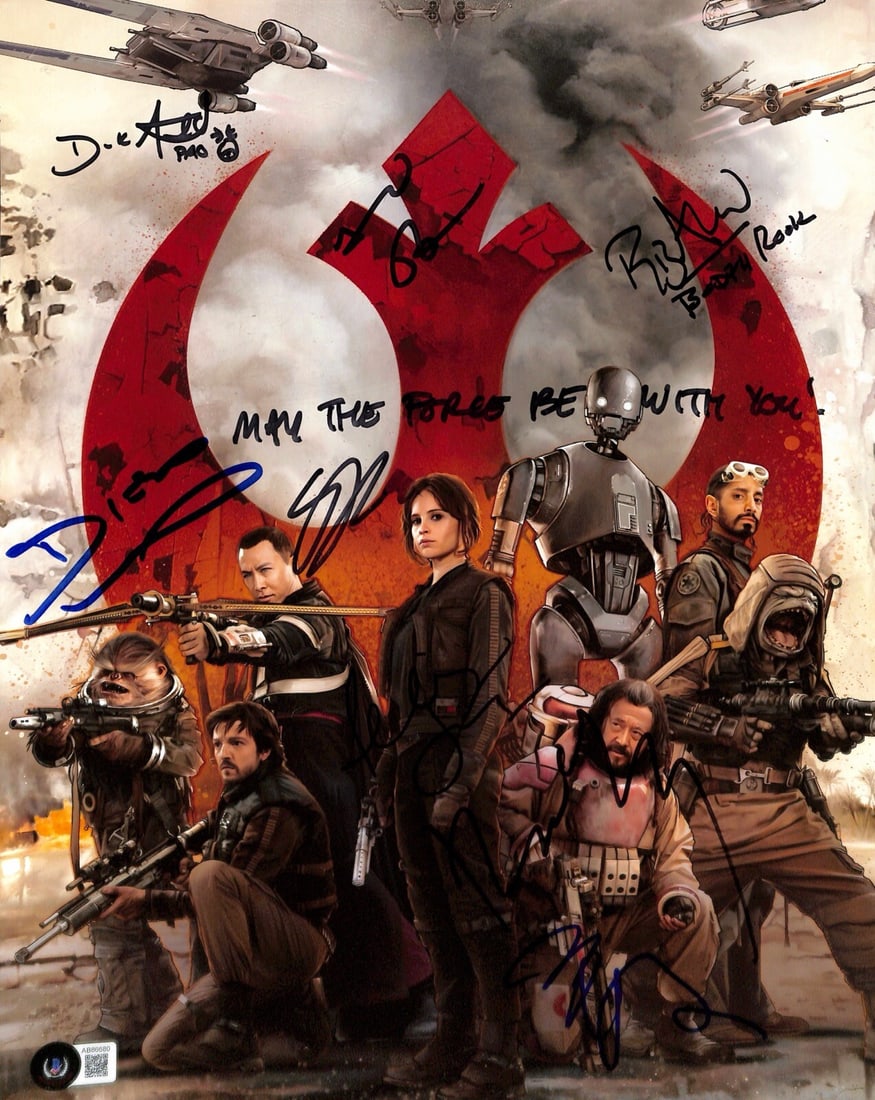 11x14 Rogue One Cast Signed Photo Beckett LOA Luna Jones Ahmed Tudyk Yen: 11x14 Rogue One Cast Signed Photo Beckett LOA Luna Jones Ahmed Tudyk Yen This is an original 11x14 color photograph from "Rogue One: A Star Wars Story," autographed in black and blue permanent markers