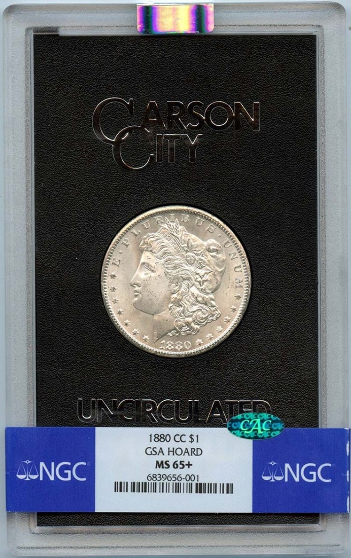 NGC MS65 Plus Carson City 1880 Morgan Dollar GSA Hoard CAC: NGC MS65 Plus Carson City 1880 Morgan Dollar GSA Hoard CAC This is an 1880-CC Morgan Dollar from the GSA Hoard, graded MS65+ by NGC with a CAC designation. Struck at the Carson City Mint, this uncircu