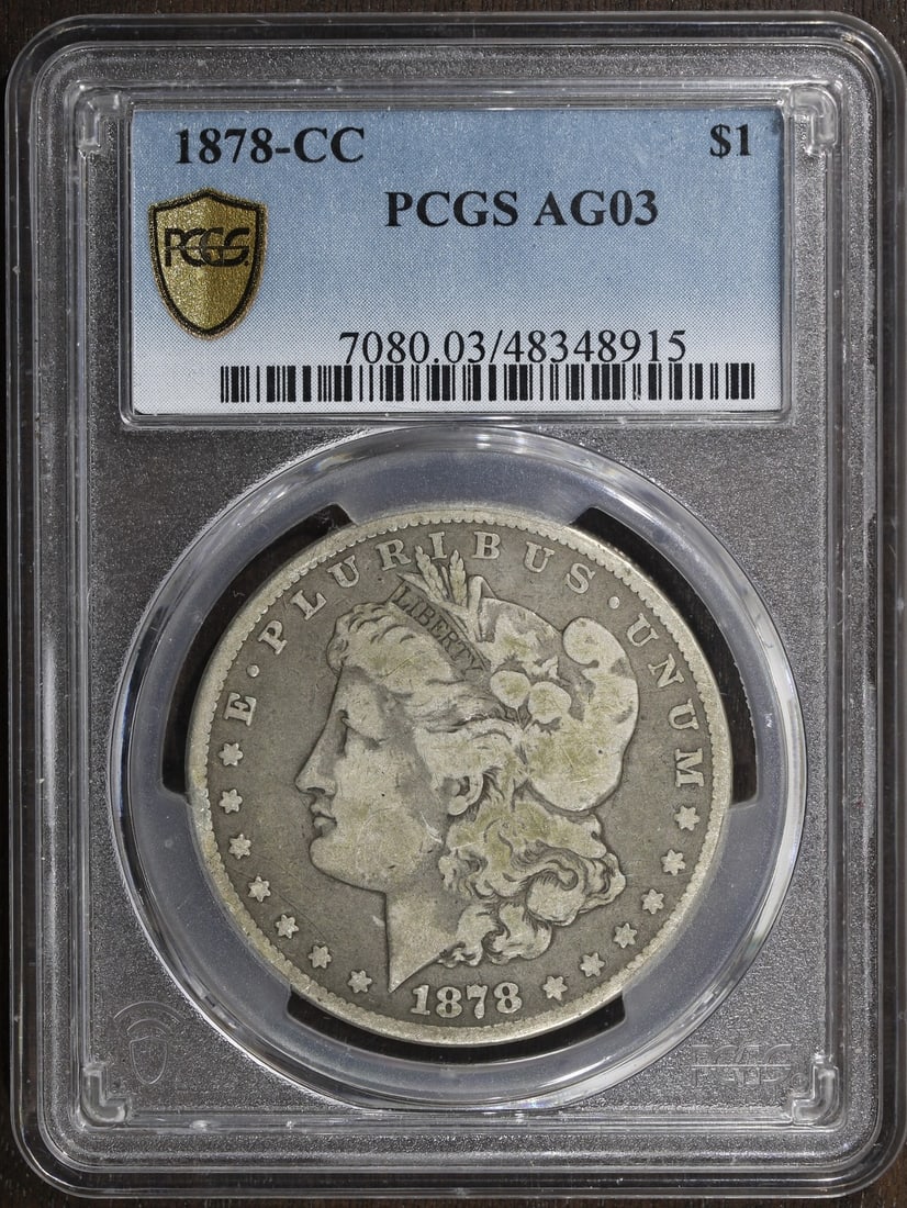PCGS Carson City 1878-CC Morgan Silver Dollar AG03: PCGS Carson City 1878-CC Morgan Silver Dollar AG03 This 1878-CC Morgan Silver Dollar is a key date coin minted in Carson City. Certified by PCGS, it is composed of 90% silver and is in circulated, pre