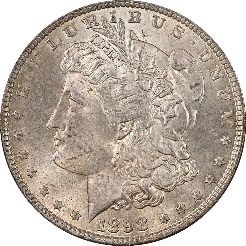 PCGS MS63 1898 Philadelphia Morgan Dollar Silver with Toning: PCGS MS63 1898 Philadelphia Morgan Dollar Silver with Toning This 1898-P Morgan Silver Dollar is certified by PCGS with a grade of MS63. The coin is composed of silver with a fineness of 0.9 and featu