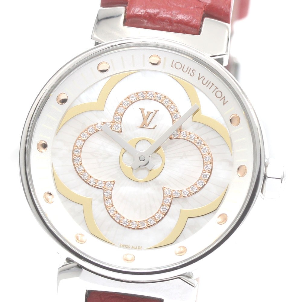Louis Vuitton QA017 Tambour Moon Divine PM Women's Quartz Watch: Louis Vuitton QA017 Tambour Moon Divine PM Women's Quartz Watch Pre-owned Louis Vuitton Tambour Moon Divine PM quartz wristwatch for women. This Swiss-made watch is identified by model QA017. Specific