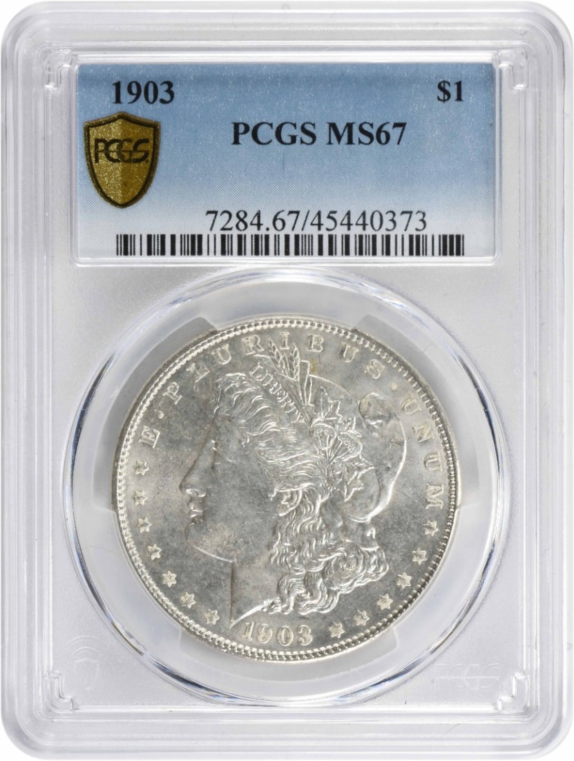 1903 Morgan Silver Dollar MS67 PCGS Uncirculated 90% Silver: 1903 Morgan Silver Dollar MS67 PCGS Uncirculated 90% Silver This 1903 Morgan Silver Dollar is a stunning representation of American coinage, graded MS67 by PCGS, ensuring its exceptional quality. Stru