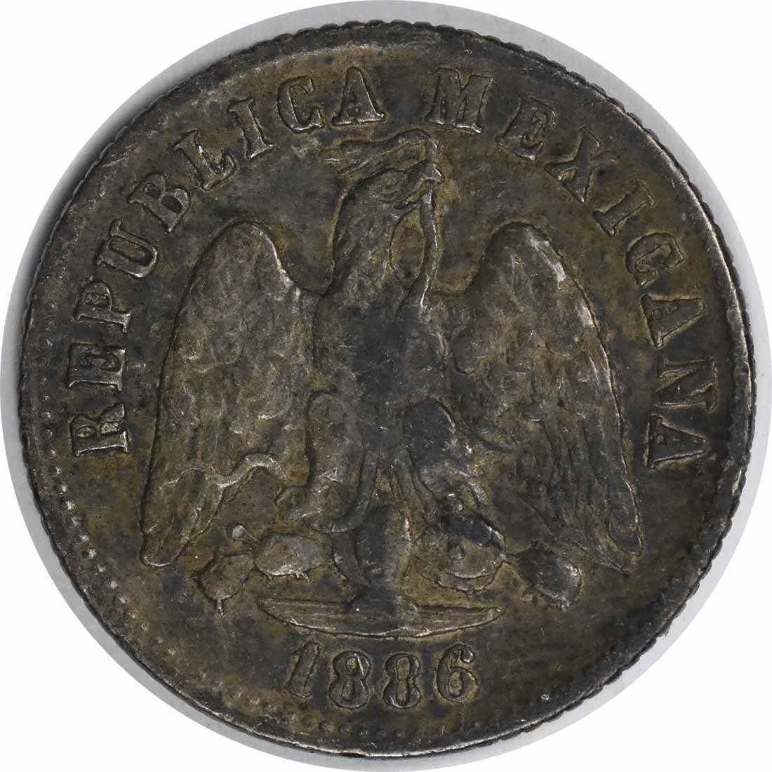 Mexico 1886 Zs S 10 Centavos Coin KM403.10 Uncertified: Mexico 1886 Zs S 10 Centavos Coin KM403.10 Uncertified This is a pre-owned 10 Centavos coin from Mexico, dated 1886. The coin is uncertified and is in Very Fine (VF) condition. Specifications Year: 18