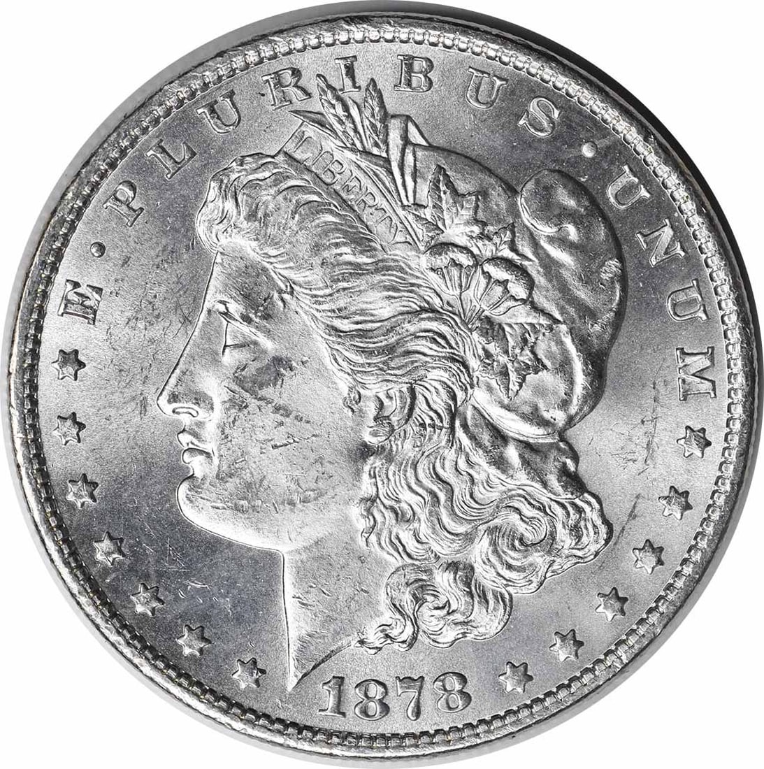 Choice BU 1878 Morgan Dollar Silver Coin 7 Tail Feathers Reverse of 1879 Uncertified: Choice BU 1878 Morgan Dollar Silver Coin 7 Tail Feathers Reverse of 1879 Uncertified This is an 1878 Morgan Silver Dollar featuring the 7 Tail Feathers Reverse of 1879. The coin is uncirculated and gr
