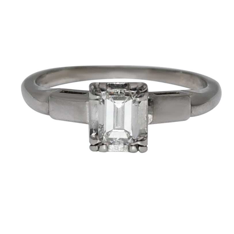 Emerald Cut Diamond Solitaire Ring 14K White Gold Size 4.25: Emerald Cut Diamond Solitaire Ring 14K White Gold Size 4.25 This ladies' solitaire ring features an emerald cut natural diamond set in white gold. The diamond weighs approximately 0.30 carats, with an