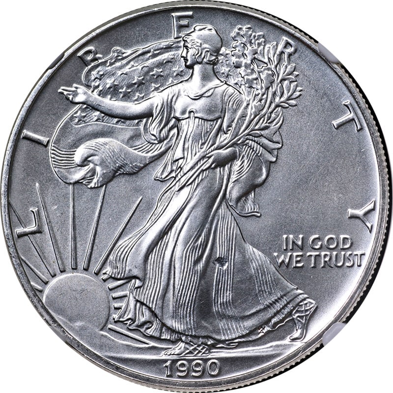 1990 Silver American Eagle $1 NGC MS67 Obverse Struck Thru Error Coin: 1990 Silver American Eagle $1 NGC MS67 Obverse Struck Thru Error Coin This 1990 Silver American Eagle $1 coin features an error known as "Obverse Struck Thru," which adds a unique aspect to its appeal