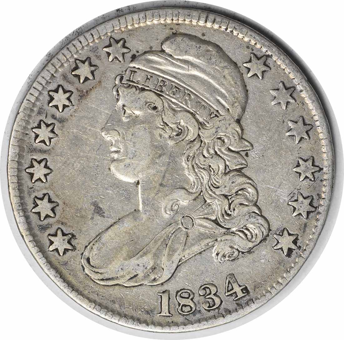 1834 Bust Half Dollar Large Date Small Letters 50C John Reich Design: 1834 Bust Half Dollar Large Date Small Letters 50C John Reich Design This 1834 Bust Half Dollar features a large date and small letters, showcasing the artistry of designer John Reich. Struck in Phila