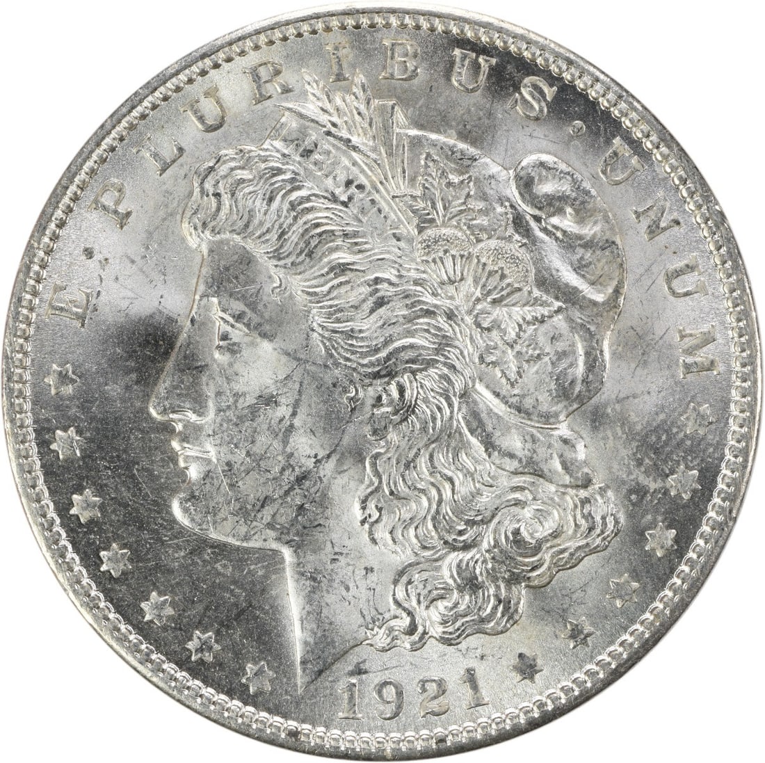 1921 Silver Dollar Morgan Coin Choice Brilliant Uncirculated Uncertified: 1921 Silver Dollar Morgan Coin Choice Brilliant Uncirculated Uncertified This is a 1921 Morgan Silver Dollar in Choice Brilliant Uncirculated (BU) condition. The coin is uncertified and features no mi