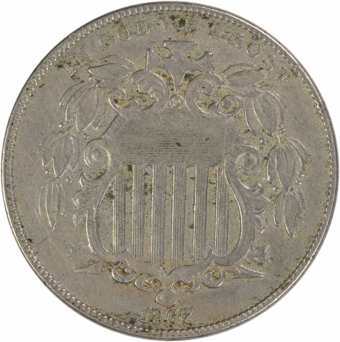 1867 5C Shield Nickel With Rays EF Uncertified: 1867 5C Shield Nickel With Rays EF Uncertified An 1867 Shield Nickel in EF grade, circulated and uncertified. Struck in Philadelphia with a plain edge, this 5-cent coin features the Shield design by J
