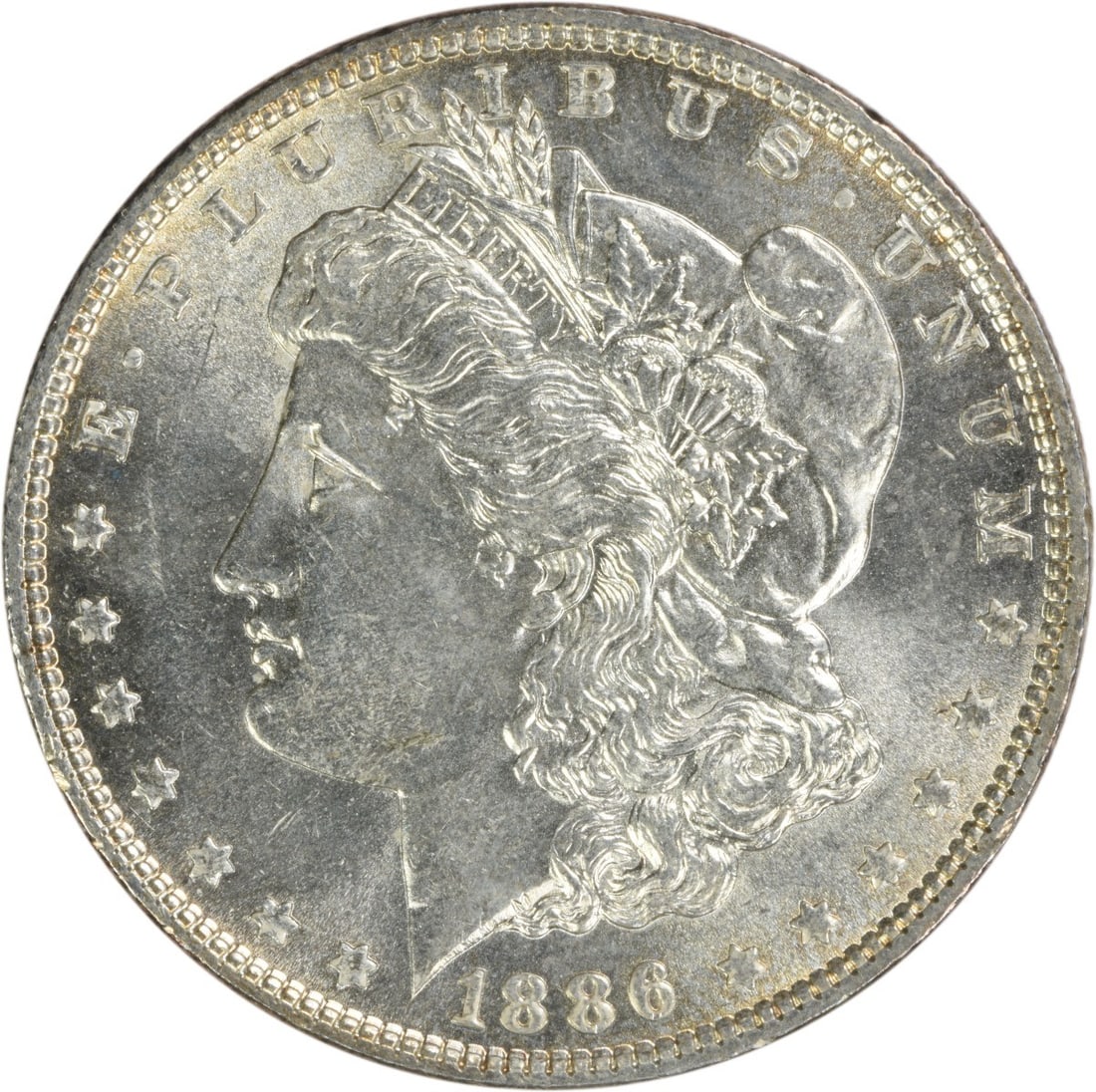 Choice BU 1886 Silver Dollar Morgan Uncirculated Uncertified: Choice BU 1886 Silver Dollar Morgan Uncirculated Uncertified This is an 1886 Morgan Silver Dollar from the United States, featuring a Choice Brilliant Uncirculated (BU) grade. The coin is composed of 