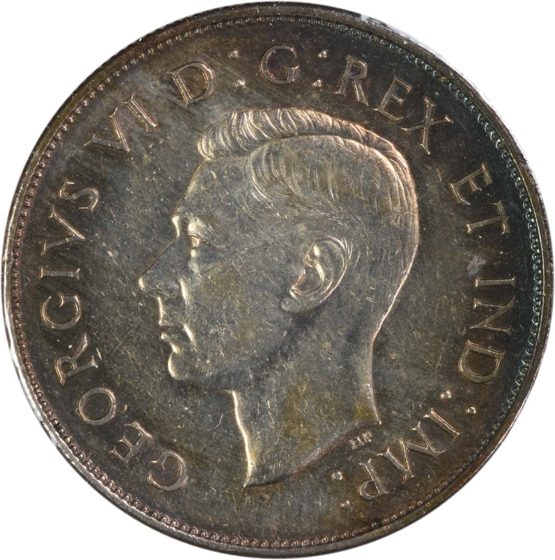 1946 Canada 50 Cent Coin KM36 AU Uncertified: 1946 Canada 50 Cent Coin KM36 AU Uncertified This is a 1946 Canada 50 cents coin featuring the Hoof 6 variety. The coin is circulated and has been graded as About Uncirculated (AU). It is uncertified 