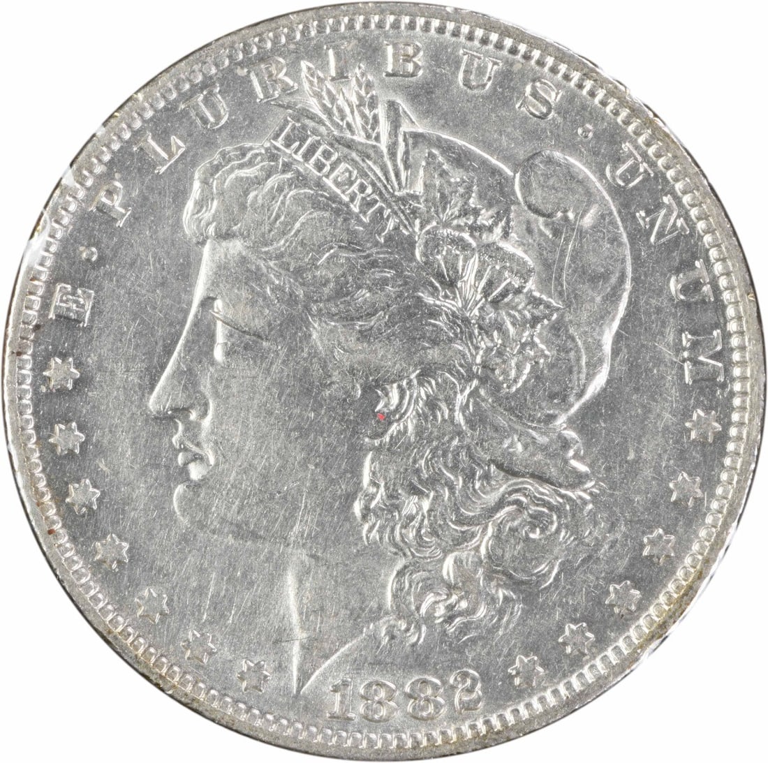 1882-O/S Morgan Silver Dollar VAM 3 AU Uncertified: 1882-O/S Morgan Silver Dollar VAM 3 AU Uncertified This 1882-O/S VAM 3 Morgan Silver Dollar is an attractive example of a classic U.S. coin. Struck at the New Orleans Mint, it features the distinctive