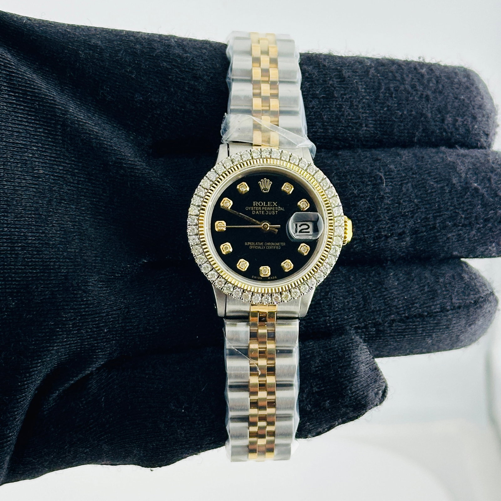 Rolex Datejust Ladies Black Yellow Diamond Dial Aftermarket Jubilee Bracelet Ref 6517: Rolex Datejust Ladies Black Yellow Diamond Dial Aftermarket Jubilee Bracelet Ref 6517 This ladies' Rolex Datejust watch features an aftermarket black dial with yellow diamond markers, complemented by 
