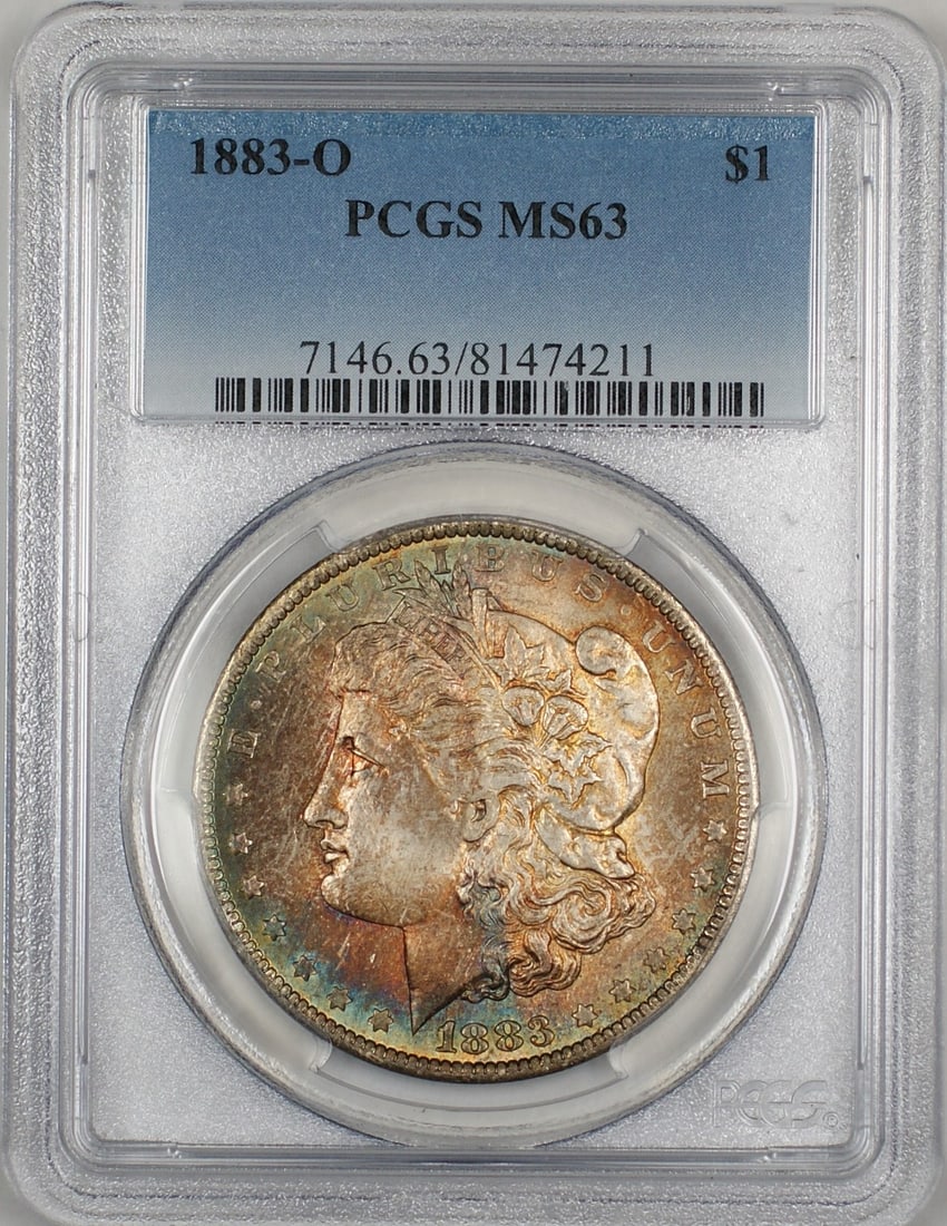 PCGS MS63 1883-O Morgan Silver Dollar Toned Obverse: PCGS MS63 1883-O Morgan Silver Dollar Toned Obverse This 1883-O Morgan Silver Dollar features a nicely toned obverse and is graded MS-63 by PCGS. Struck in New Orleans, this uncirculated coin is compo