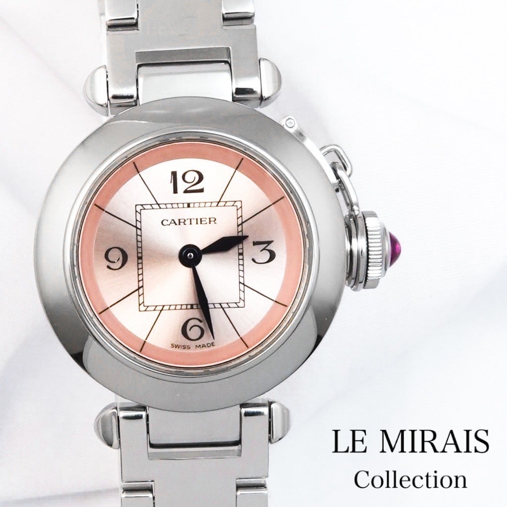 Cartier 2973 Miss Pasha women's quartz wristwatch with pink dial: Cartier 2973 Miss Pasha women's quartz wristwatch with pink dial Cartier Miss Pasha 2973 is a pre-owned women's wristwatch with a pink dial and quartz movement. This luxury watch is made in Switzerlan
