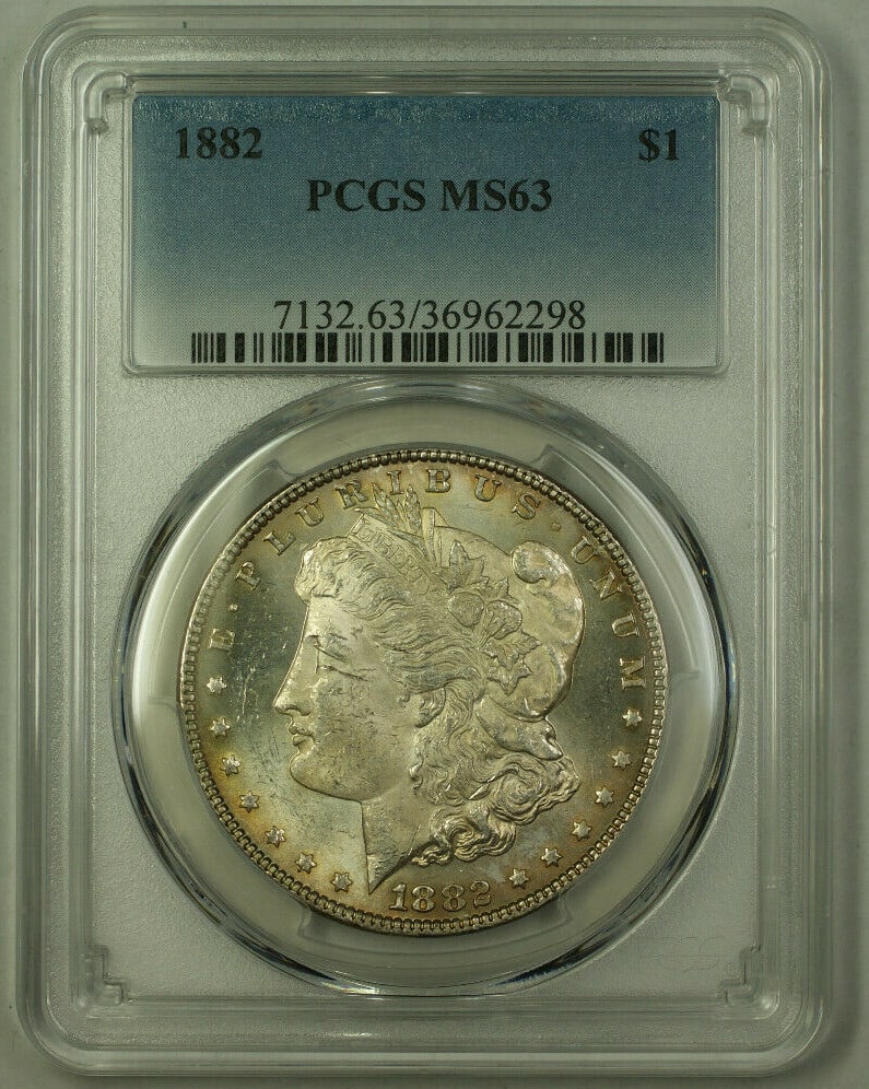 1882 PCGS MS63 Morgan Dollar Semi Prooflike Toned: 1882 PCGS MS63 Morgan Dollar Semi Prooflike Toned This is an 1882 Morgan Silver Dollar graded MS-63 by PCGS. The coin is uncirculated, features a semi proof-like (PL) appearance, and displays attracti