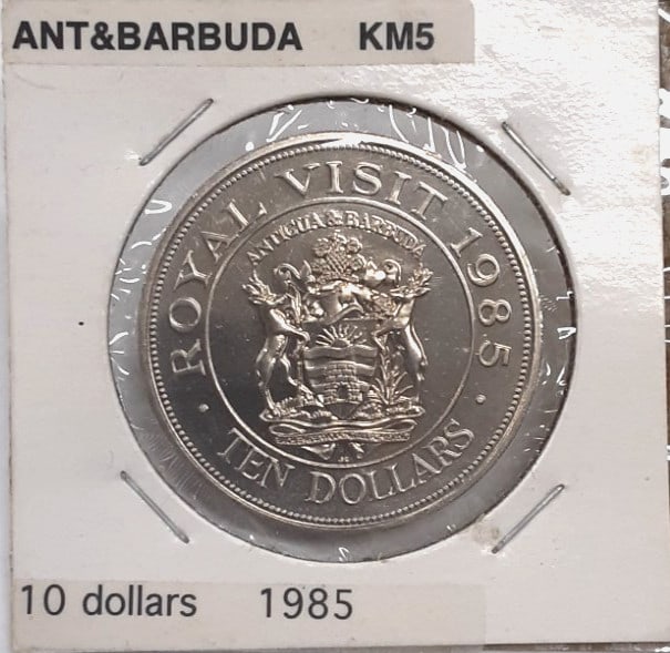 1985 Antigua and Barbuda 10 Dollar Royal Visit Copper-Nickel Coin BU: 1985 Antigua and Barbuda 10 Dollar Royal Visit Copper-Nickel Coin BU This 1985 Antigua & Barbuda 10 Dollar coin features Queen Elizabeth II and was struck to commemorate her Royal Visit. Produced by t