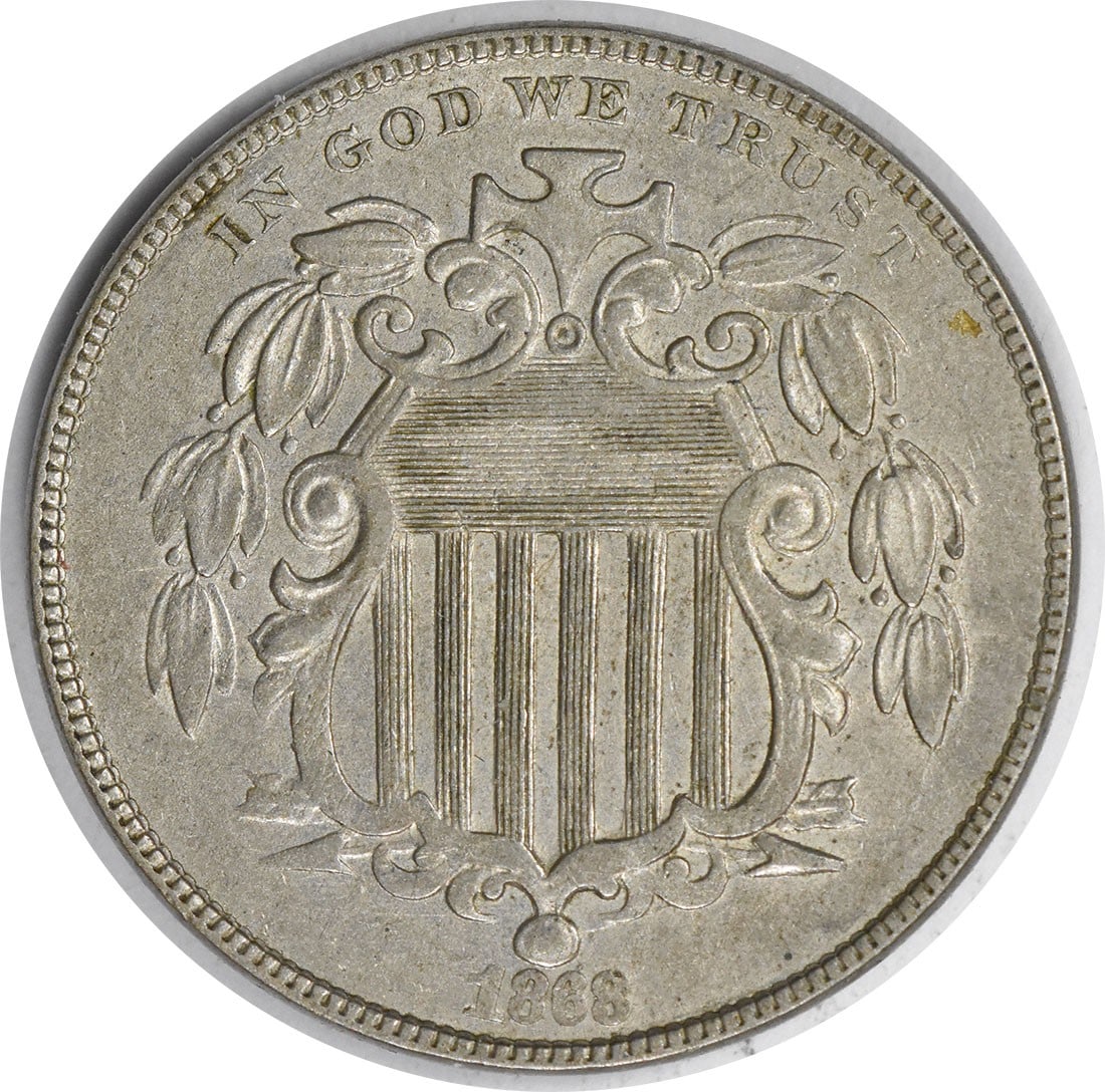 1868 Shield Nickel Var 1 FS-901 AU Uncertified 5C Coin: 1868 Shield Nickel Var 1 FS-901 AU Uncertified 5C Coin This 1868 Shield Nickel, designated as Var 1 FS-901, showcases a rich history with its unique design by James Barton Longacre. The coin is circul