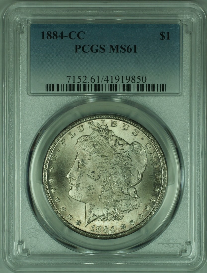 PCGS MS61 Carson City 1884 Morgan Silver Dollar Lightly Toned Certified Coin: PCGS MS61 Carson City 1884 Morgan Silver Dollar Lightly Toned Certified Coin This 1884-CC Morgan Silver Dollar is certified by PCGS with a grade of MS-61. Minted in Carson City, it features lightly to