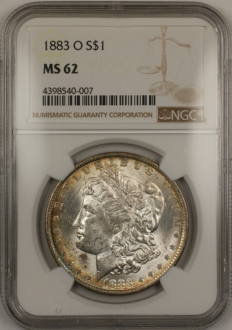 1883-O NGC MS-62 Morgan Silver Dollar Toned: 1883-O NGC MS-62 Morgan Silver Dollar Toned This 1883-O Morgan Silver Dollar is graded MS-62 by NGC and features attractive toning. Minted in New Orleans, this uncirculated coin is composed of silver 