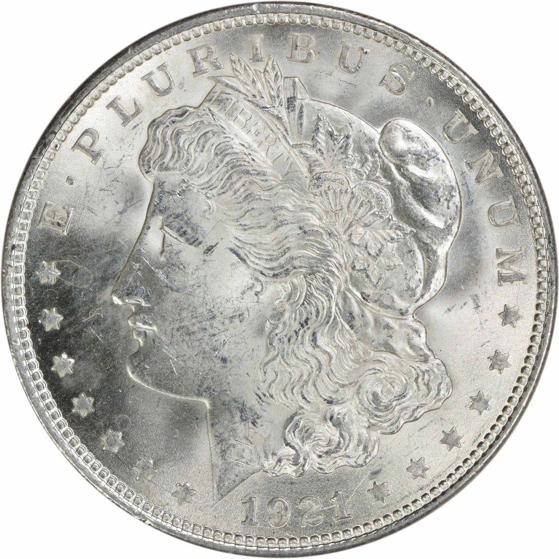 1921 Silver Dollar Morgan Choice BU Uncirculated No Mint Mark: 1921 Silver Dollar Morgan Choice BU Uncirculated No Mint Mark This is a 1921 Morgan Silver Dollar from the United States. The coin is uncirculated and graded as Choice BU. It features no mint mark and