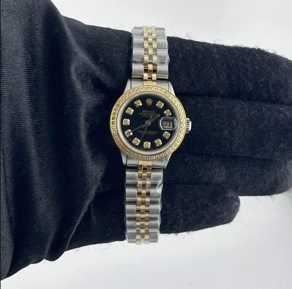 Ladies Aftermarket Black Diamond Dial Jubilee Bracelet Rolex Ref 6916 Datejust Watch: Ladies Aftermarket Black Diamond Dial Jubilee Bracelet Rolex Ref 6916 Datejust Watch This ladies Rolex Datejust features an aftermarket black diamond dial and an aftermarket Jubilee bracelet with a hi