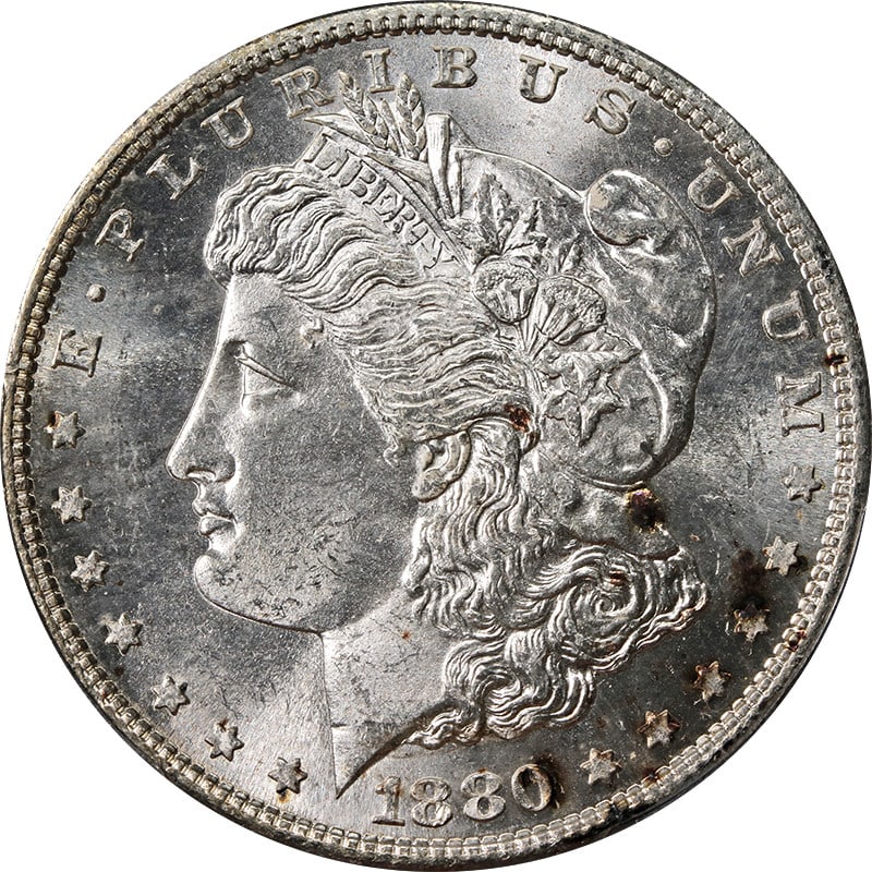 PCGS MS63 1880-S Morgan Dollar with Obverse and Reverse Toning: PCGS MS63 1880-S Morgan Dollar with Obverse and Reverse Toning The 1880-S Morgan Silver Dollar is graded MS63 by PCGS and features spots of toning on the obverse with some light toning on the reverse.