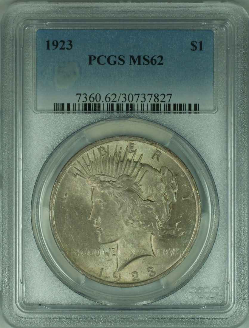 PCGS MS62 1923 Peace Dollar Uncirculated Philadelphia Silver Coin: PCGS MS62 1923 Peace Dollar Uncirculated Philadelphia Silver Coin This 1923 Peace Silver Dollar is certified by PCGS with a grade of MS-62. Struck at the Philadelphia Mint, the coin is uncirculated an