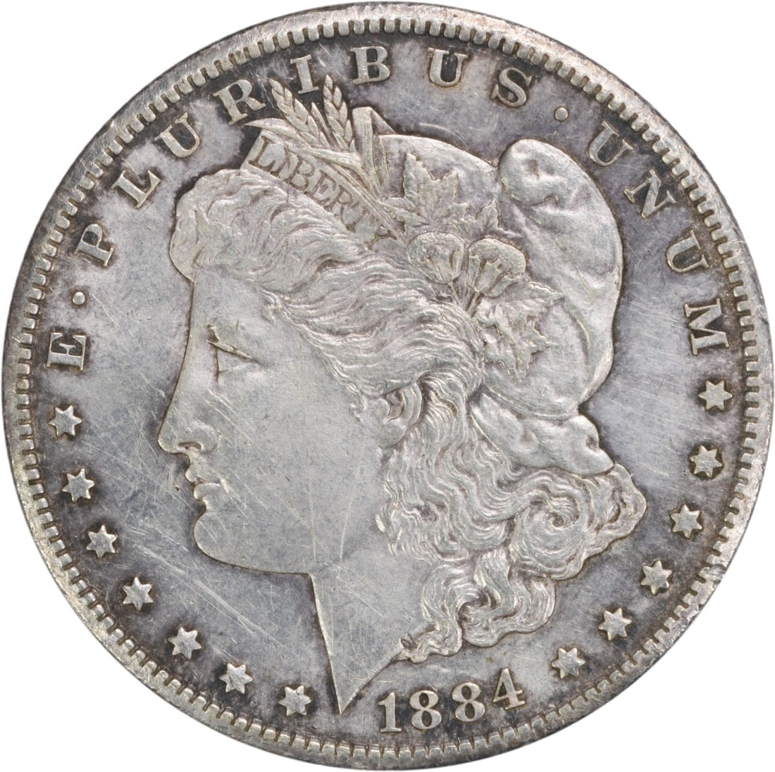 1884-CC Morgan Silver Dollar AU Uncertified 90% Silver Coin: 1884-CC Morgan Silver Dollar AU Uncertified 90% Silver Coin This 1884-CC Morgan Silver Dollar showcases a beautiful design by George T. Morgan and is a notable piece for collectors. The coin is circul