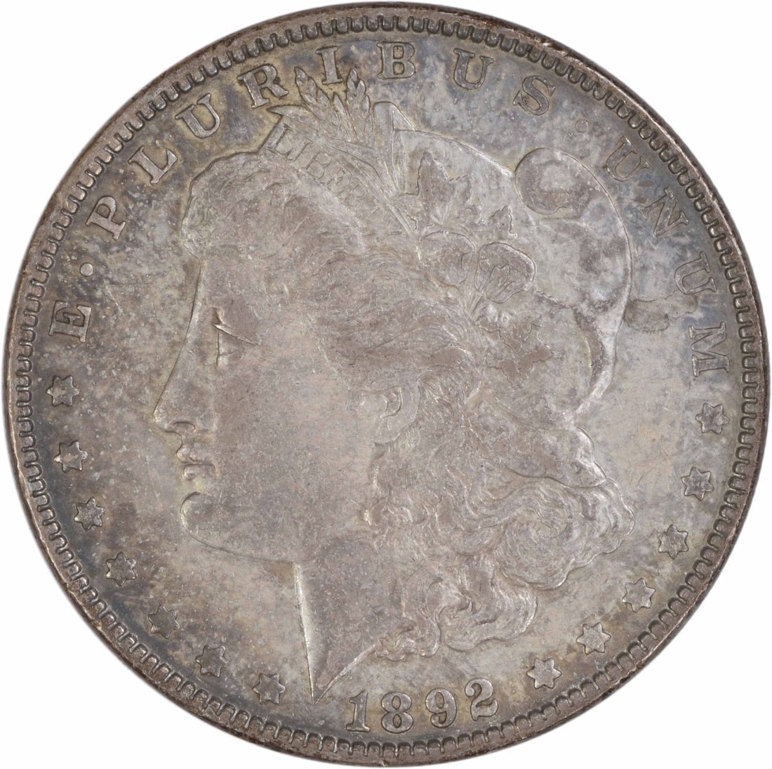 1892 EF Morgan Dollar Philadelphia 90 Percent Silver Uncertified: 1892 EF Morgan Dollar Philadelphia 90 Percent Silver Uncertified This 1892 Morgan Silver Dollar was struck at the Philadelphia Mint and features a composition of 90% silver and 10% copper. Designed by
