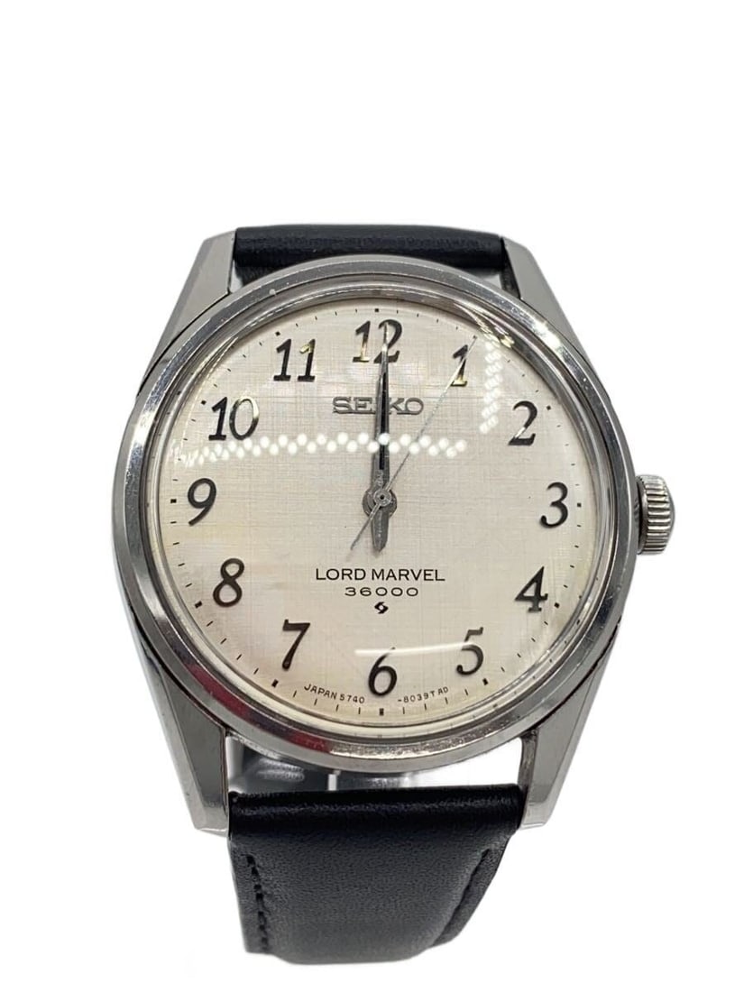 Seiko Lord Marvel 36000 Silver Leather Wristwatch: Seiko Lord Marvel 36000 Silver Leather Wristwatch This Seiko Lord Marvel 36000 5740-8000 men's wristwatch features a classic design with a silver-tone case and a leather band. The watch is in pre-owne