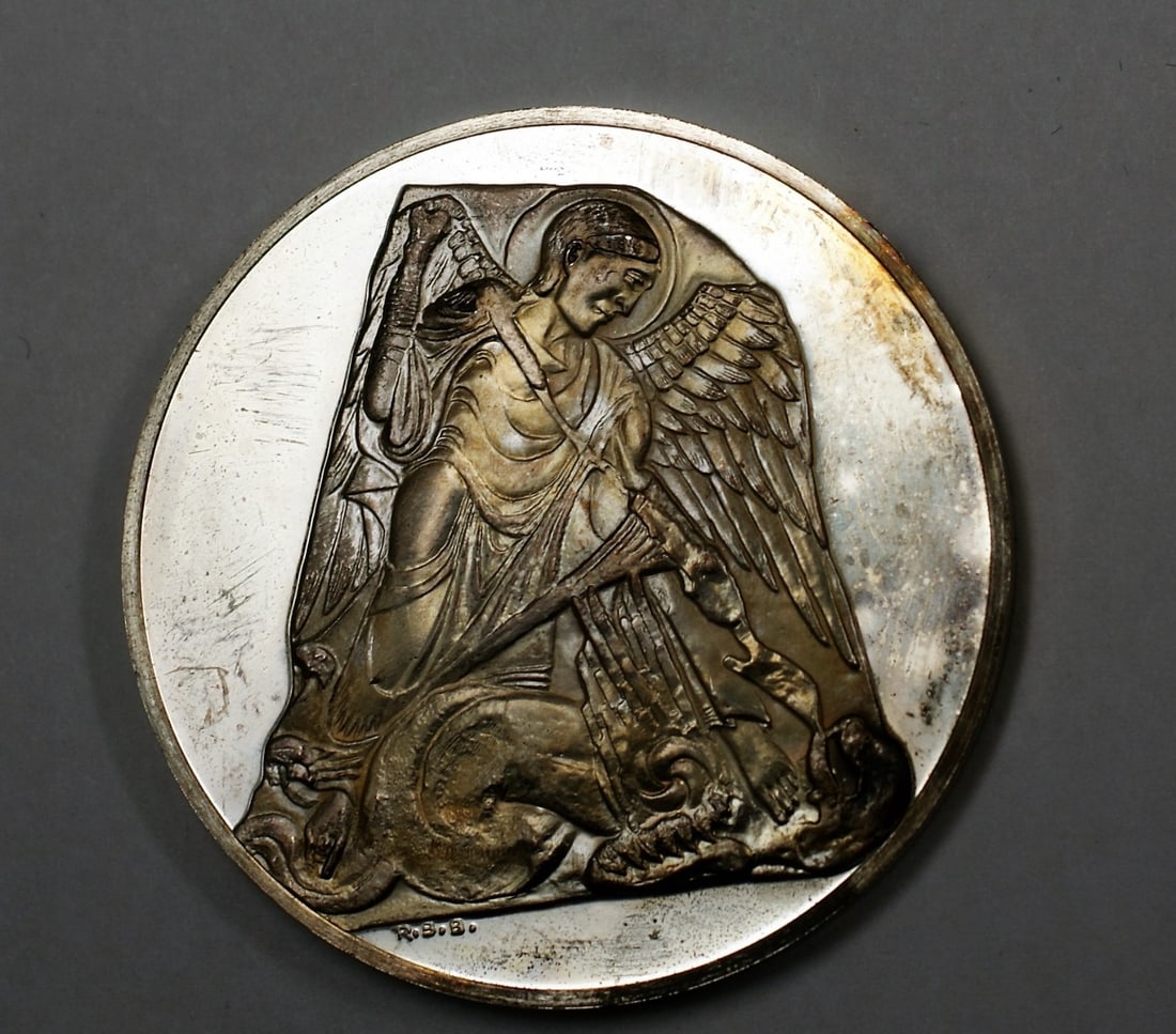 Sterling Silver Proof Medal 1.3 Ozt Saint Michel Defeats Dragon: Sterling Silver Proof Medal 1.3 Ozt Saint Michel Defeats Dragon This proof medal features Saint Michel slaying the dragon and is crafted from sterling silver. The medal weighs approximately 1.3 troy o