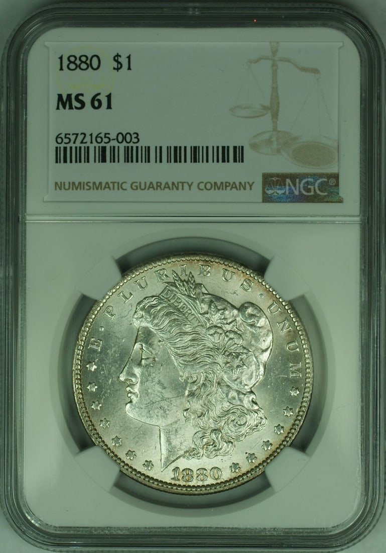 1880 Morgan Dollar NGC MS-61 Silver Coin with Toned Reverse: 1880 Morgan Dollar NGC MS-61 Silver Coin with Toned Reverse This is an 1880 Morgan Silver Dollar coin graded MS-61 by NGC, featuring a toned reverse. The coin was minted in Philadelphia and is compose