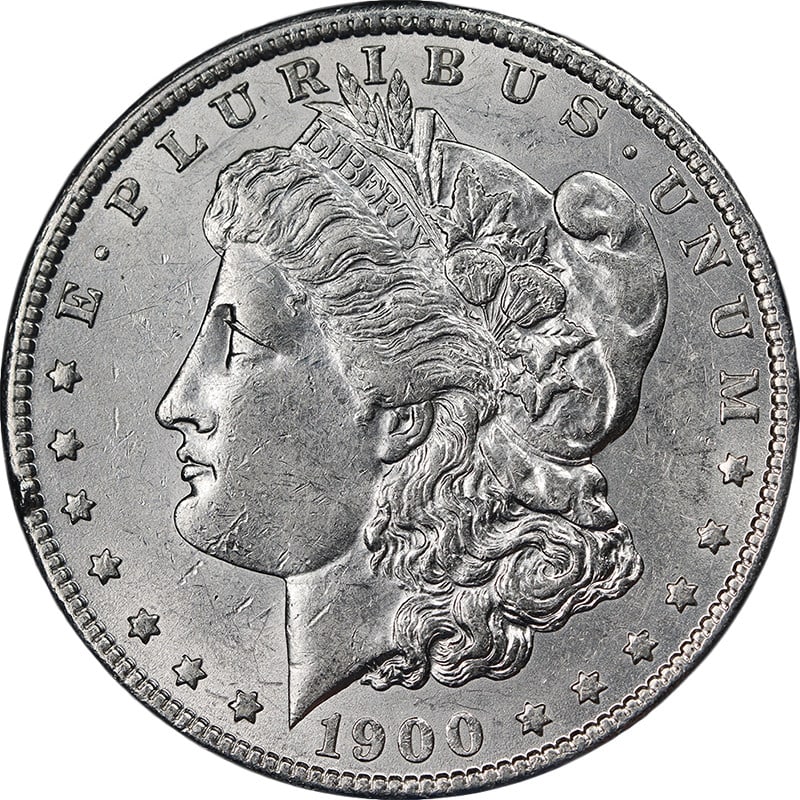 1900 O CC Morgan Silver Dollar AU BU Details Uncertified: 1900 O CC Morgan Silver Dollar AU BU Details Uncertified 1900-O/CC Morgan Silver Dollar in circulated condition with AU/BU details and bright white appearance. It is described as a key date coin with 